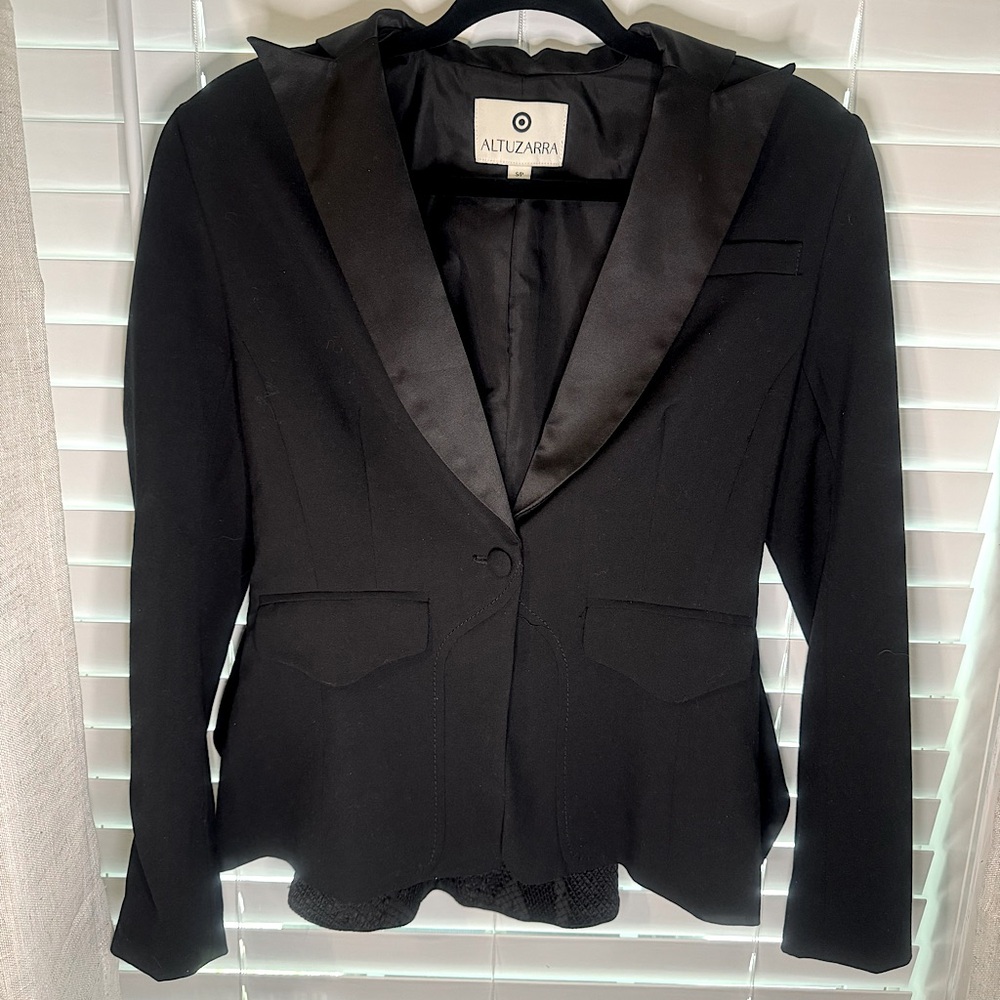 Chic & Stylish Altuzarra Black Peplum Blazer. Satin lapel detail. Front pockets.